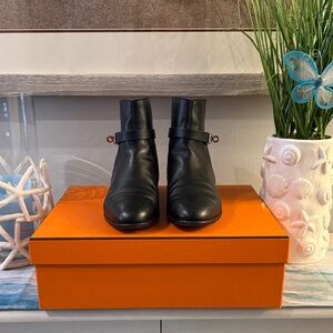 Hermes NEO ANKLE BOOT 
Black Ankle Boots with Strap Detail
